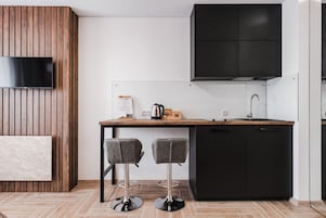 Signature Studio | Living area | 32-inch flat-screen TV with digital channels, Smart TV