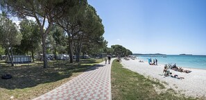 Sun loungers, beach umbrellas, scuba diving