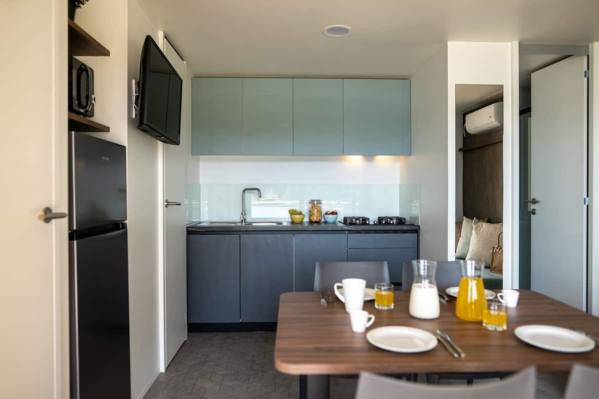 Mobile Home, Lagoon View | Private kitchen | Highchair