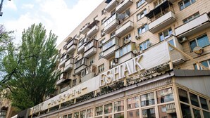 A multi-story building with balconies and large windows. - CityApartments Kyiv Palace "Ukraine" (Kyiv)