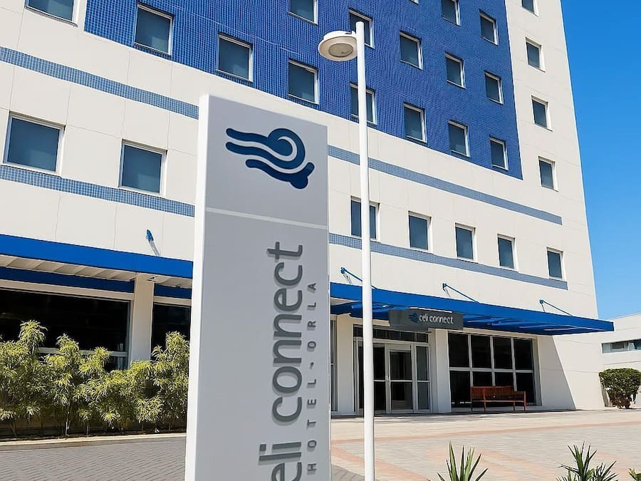 A hotel entrance with a sign reading "celi connect HOTEL ORLA".