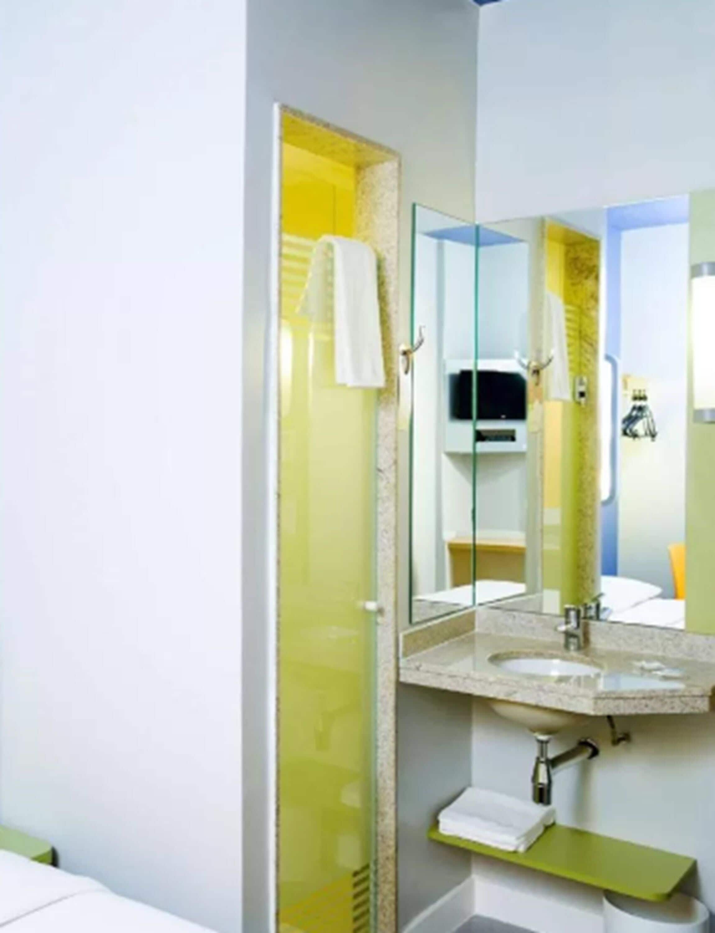 shower, eco-friendly toiletries, hair dryer, towels