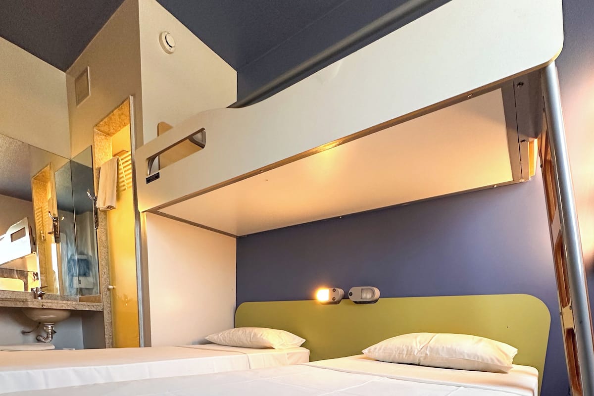 Apartamento com 3 Camas de Solteiro.