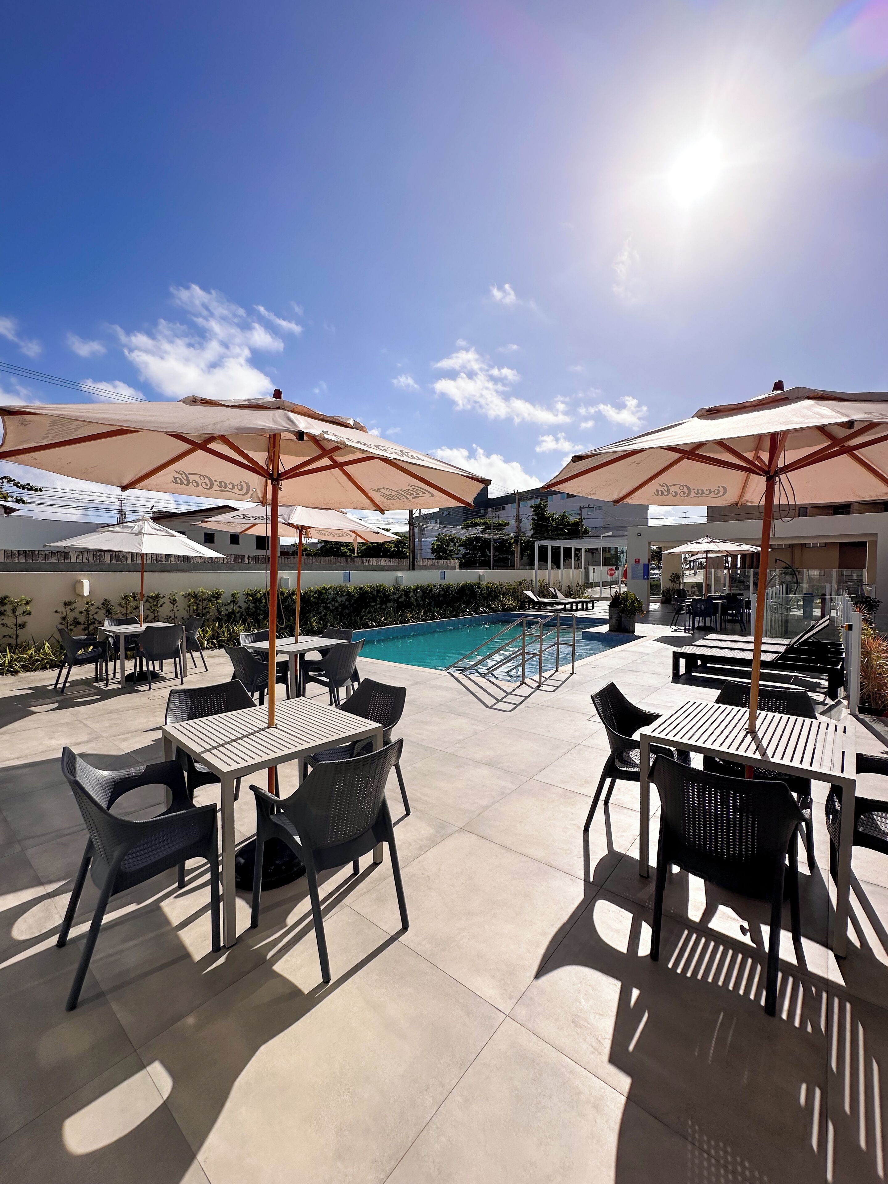 outdoor pool, pool loungers