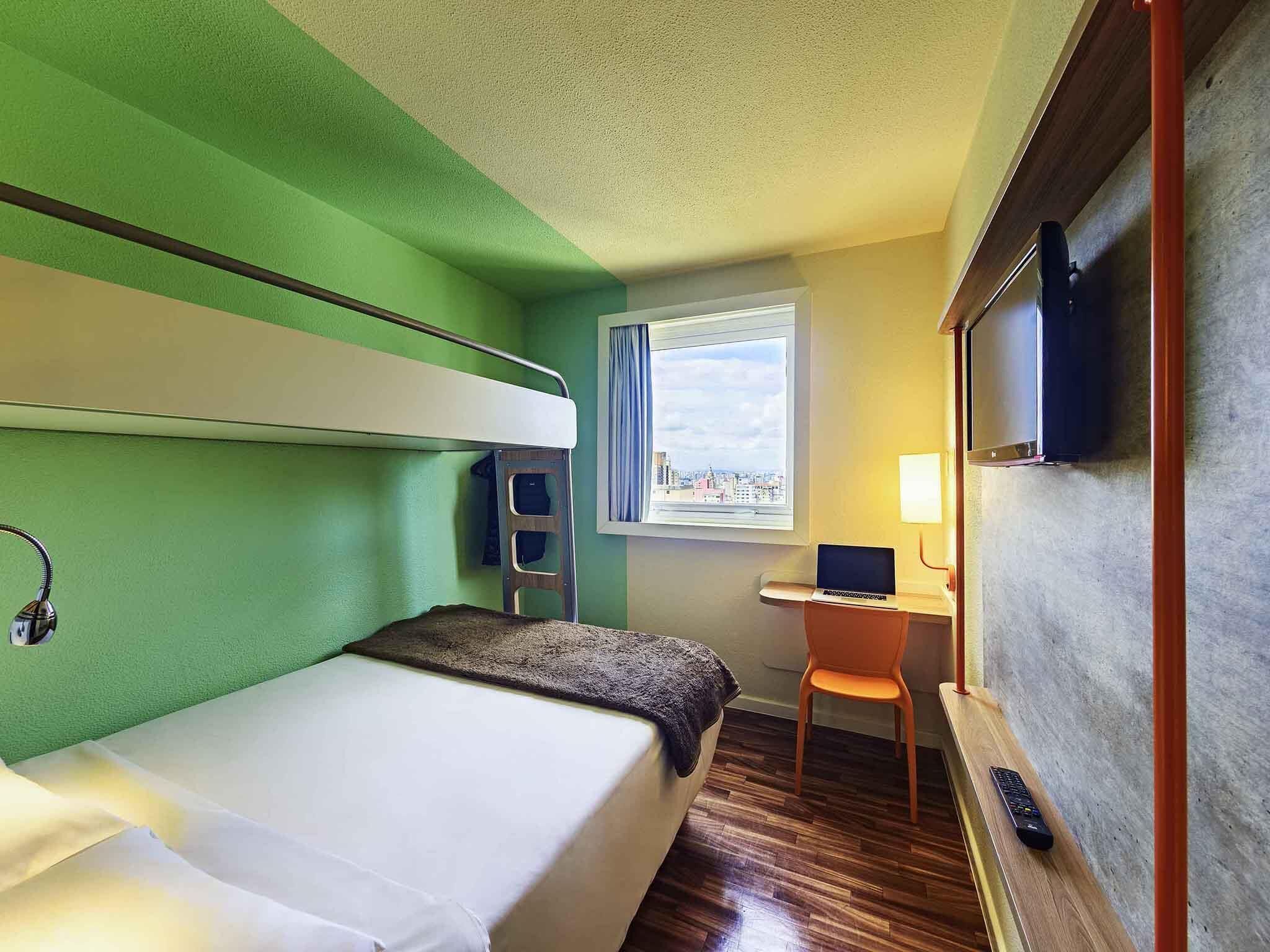 Standard Room, Multiple Beds | Individually decorated, desk, laptop workspace, blackout curtains