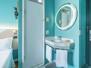 Shower, eco-friendly toiletries, towels, soap