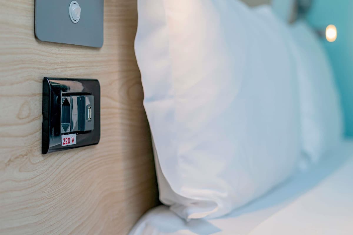 Cortinas blackout, Wi-Fi de cortesia, roupa de cama