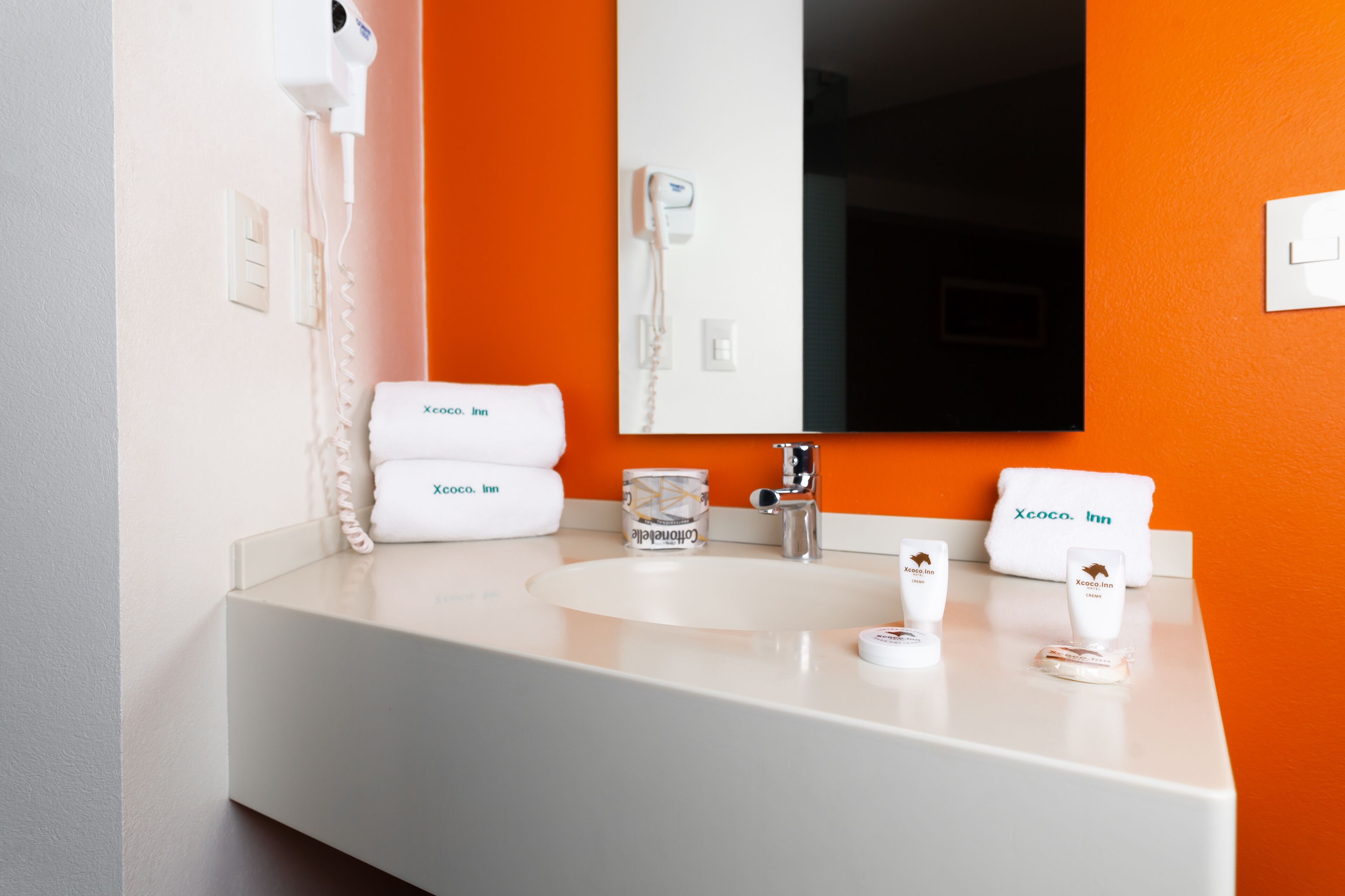 junior suite | bathroom | shower, hair dryer, towels