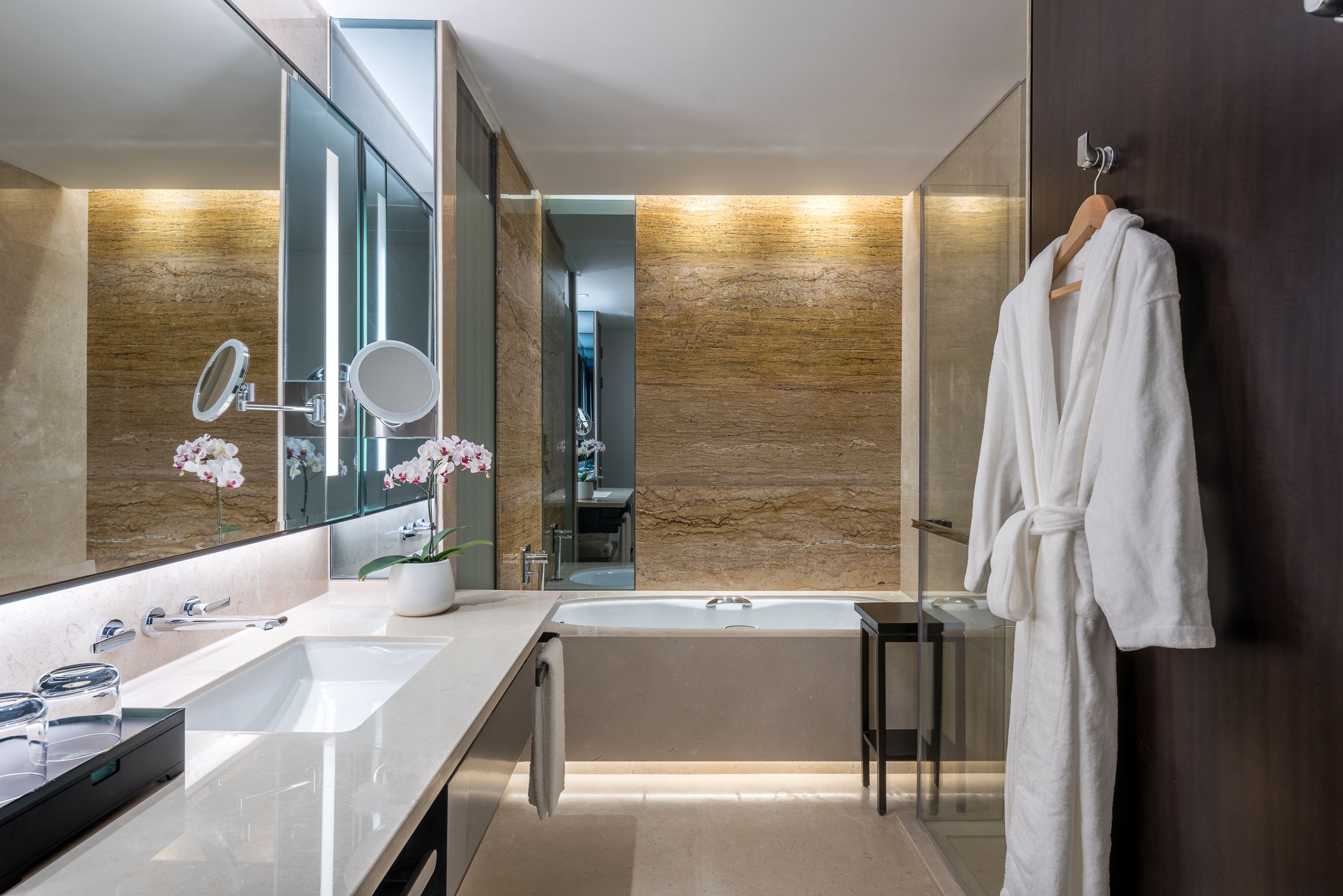 separate bathtub and shower, free toiletries, hair dryer, slippers