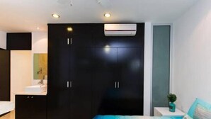 Comfort Condo, 2 Bedrooms, City View, Courtyard Area | 2 bedrooms, in-room safe, iron/ironing board, rollaway beds - Comfortable 2BR Loft 300 m from the beach by Happy Address (Playa del Carmen)