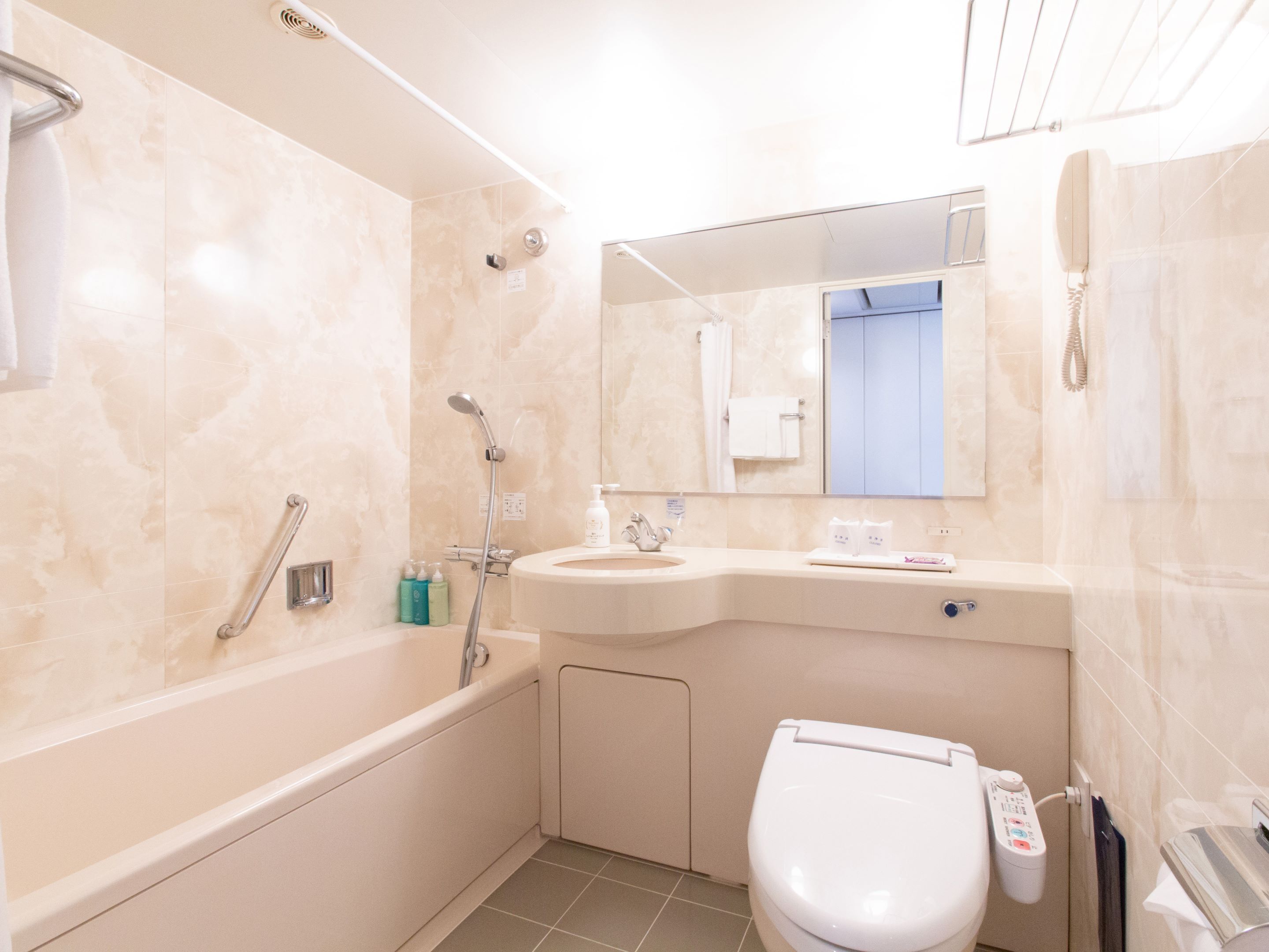 combined shower/bathtub, free toiletries, hair dryer, bathrobes