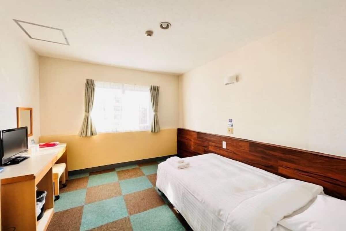 Blackout curtains, free WiFi, bed sheets