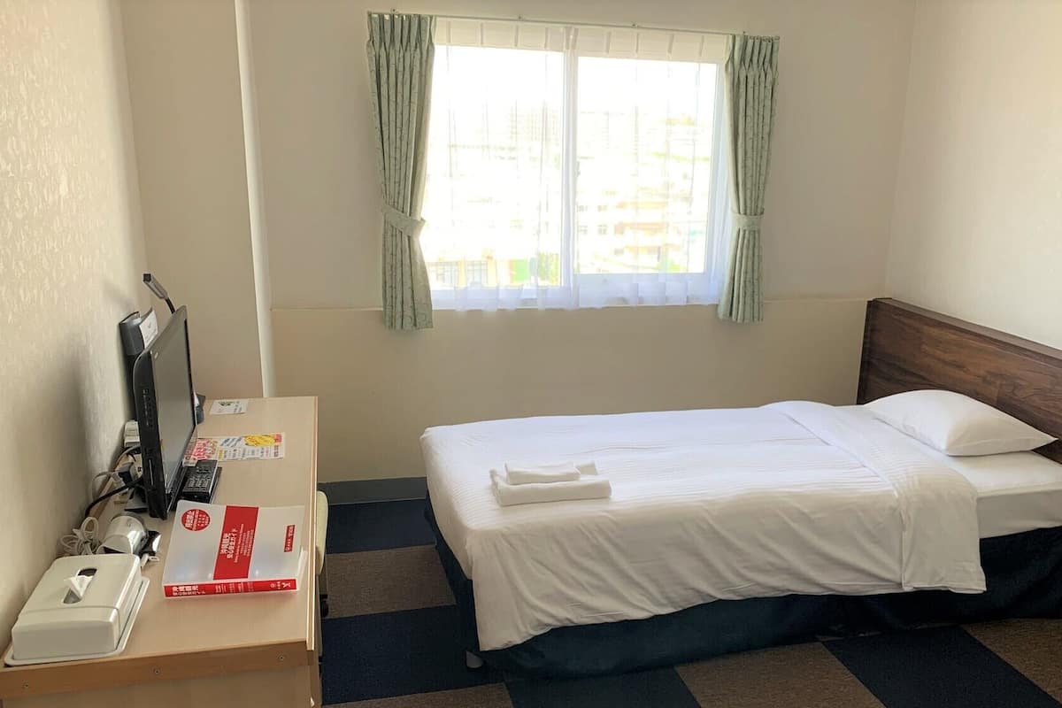 Blackout drapes, WiFi (free), bed sheets