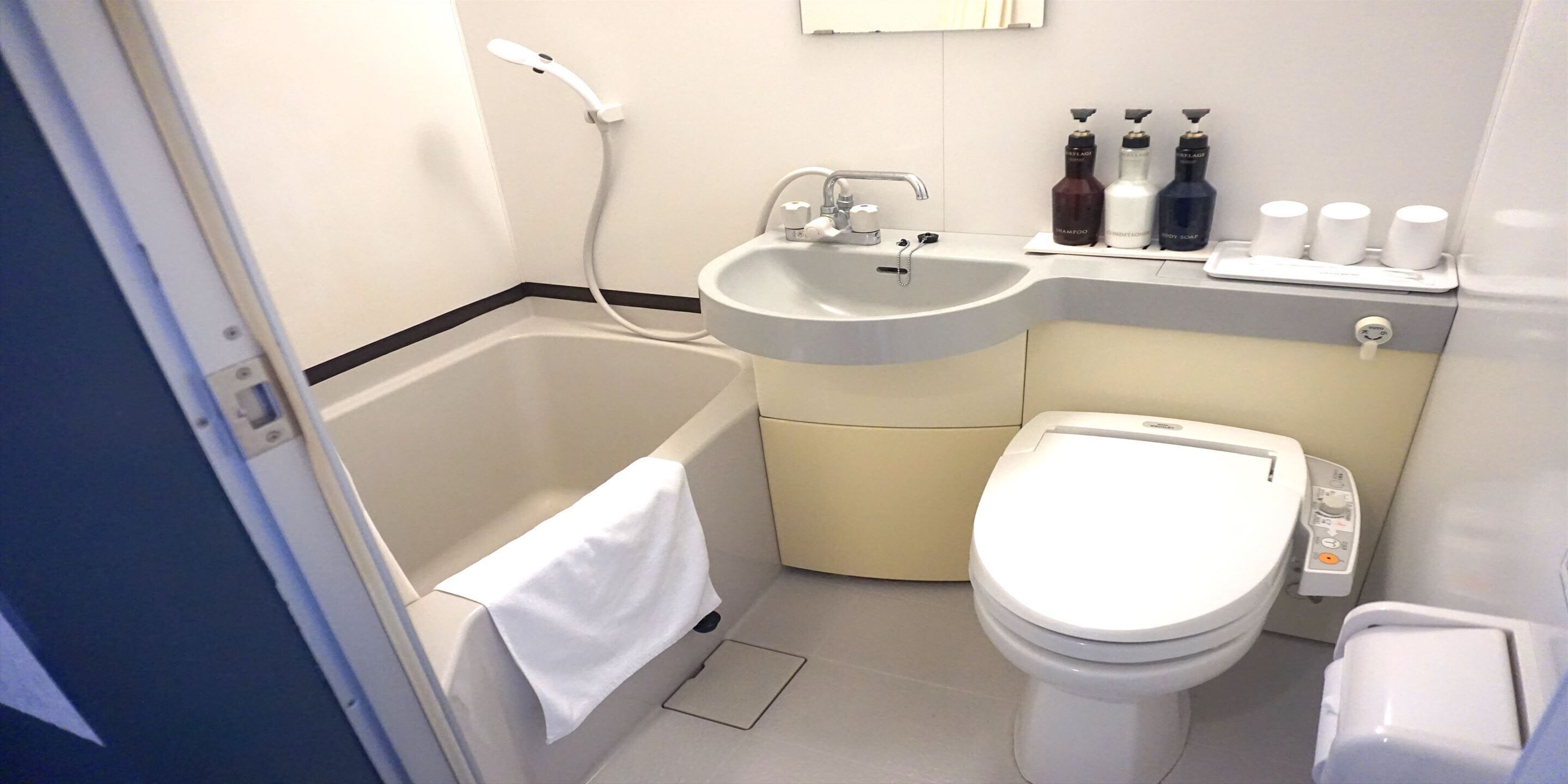 free toiletries, hair dryer, slippers, towels