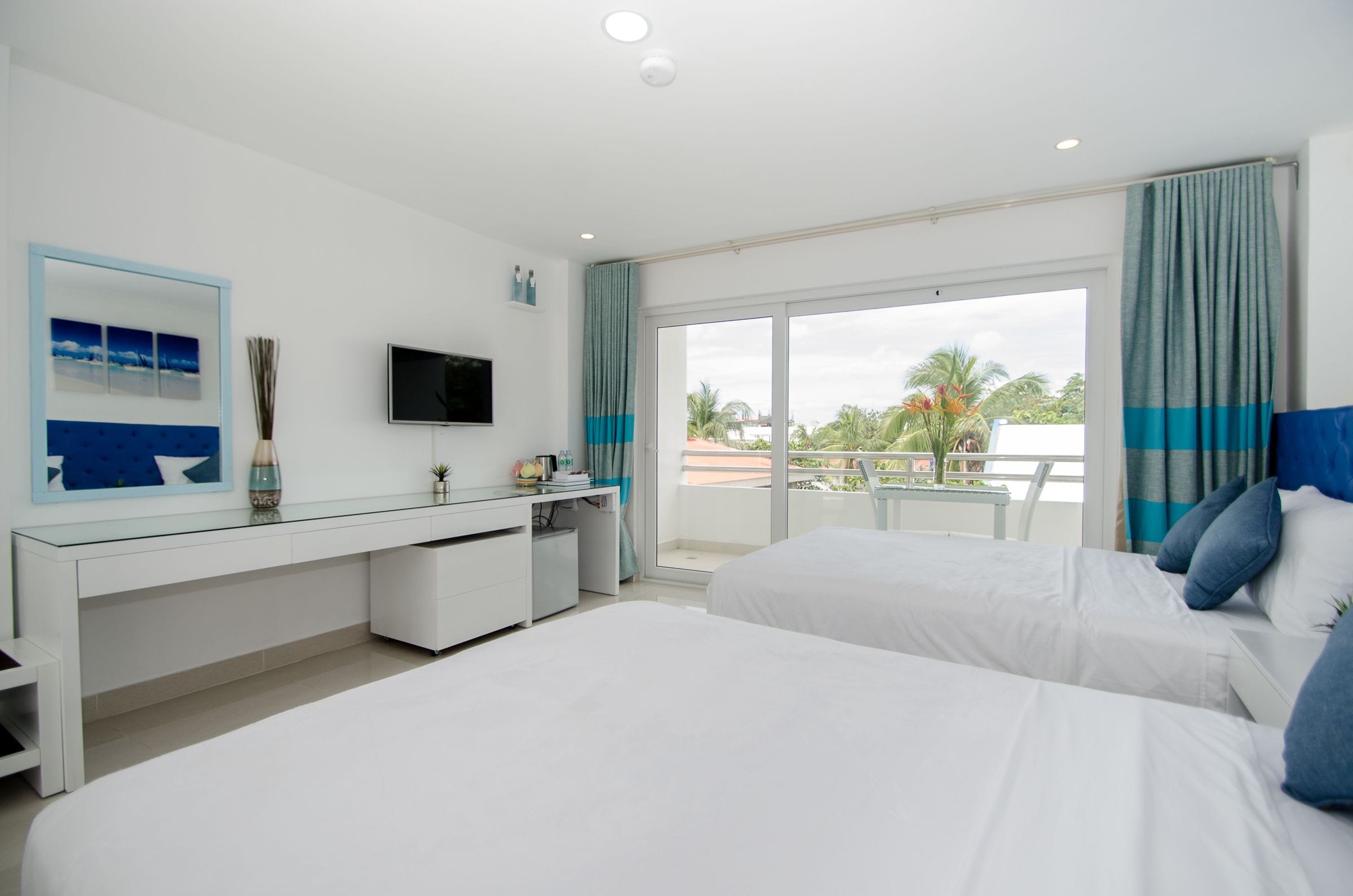 twin queen suite | minibar, in-room safe, desk, blackout curtains