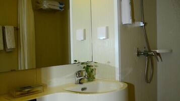 Shower, free toiletries, hair dryer, slippers