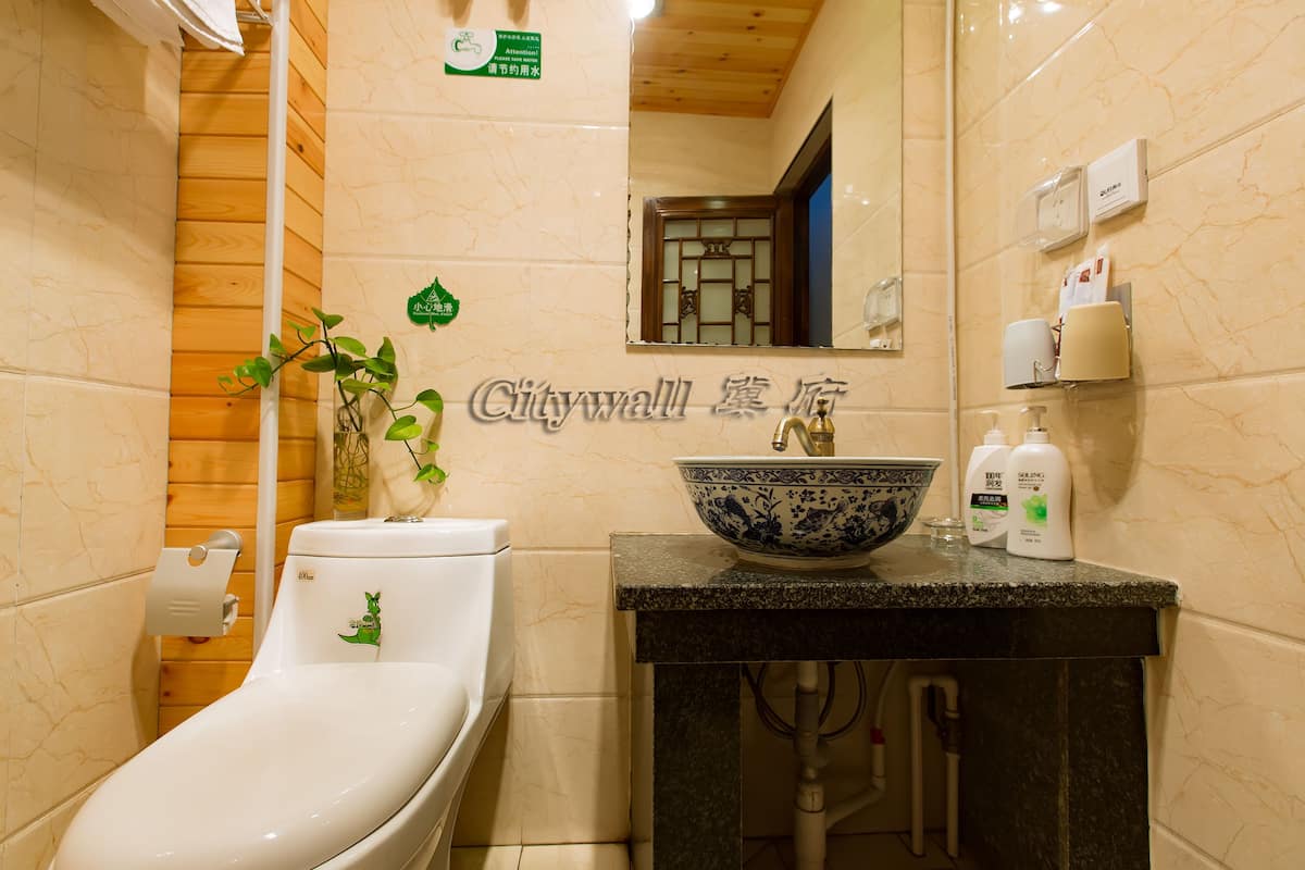 Shower, free toiletries, hair dryer, slippers