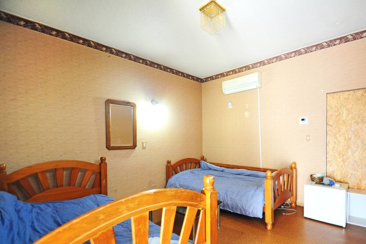 Habitación con 2 camas individuales