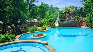 Outdoor pool, pool umbrellas, pool loungers