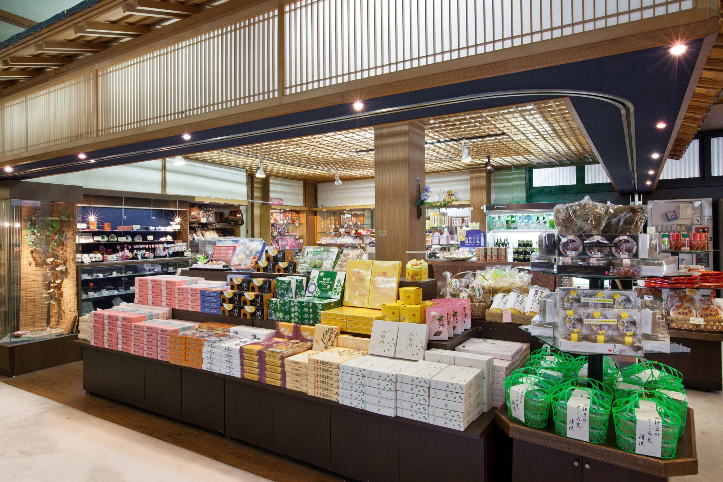 A spacious retail store with various products on display, including boxed items and baskets.
