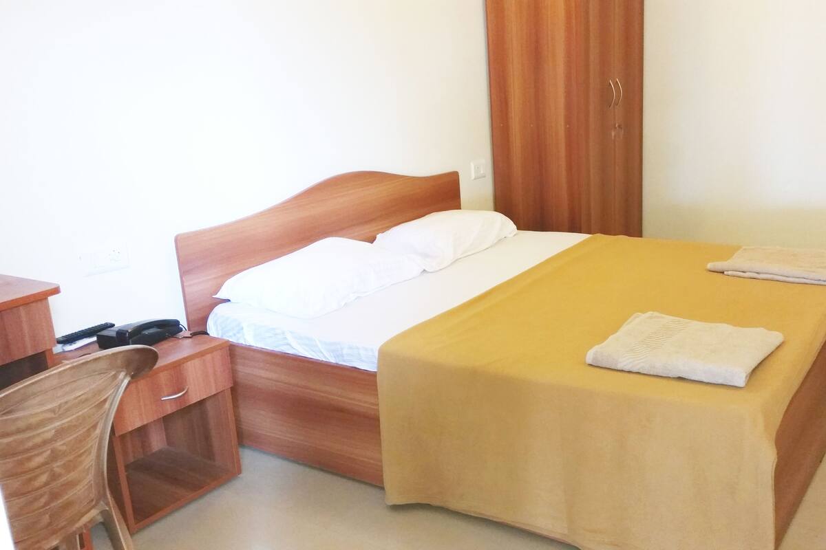 Standard Room, Smoking | 1 bedroom, in-room safe, desk, iron/ironing board