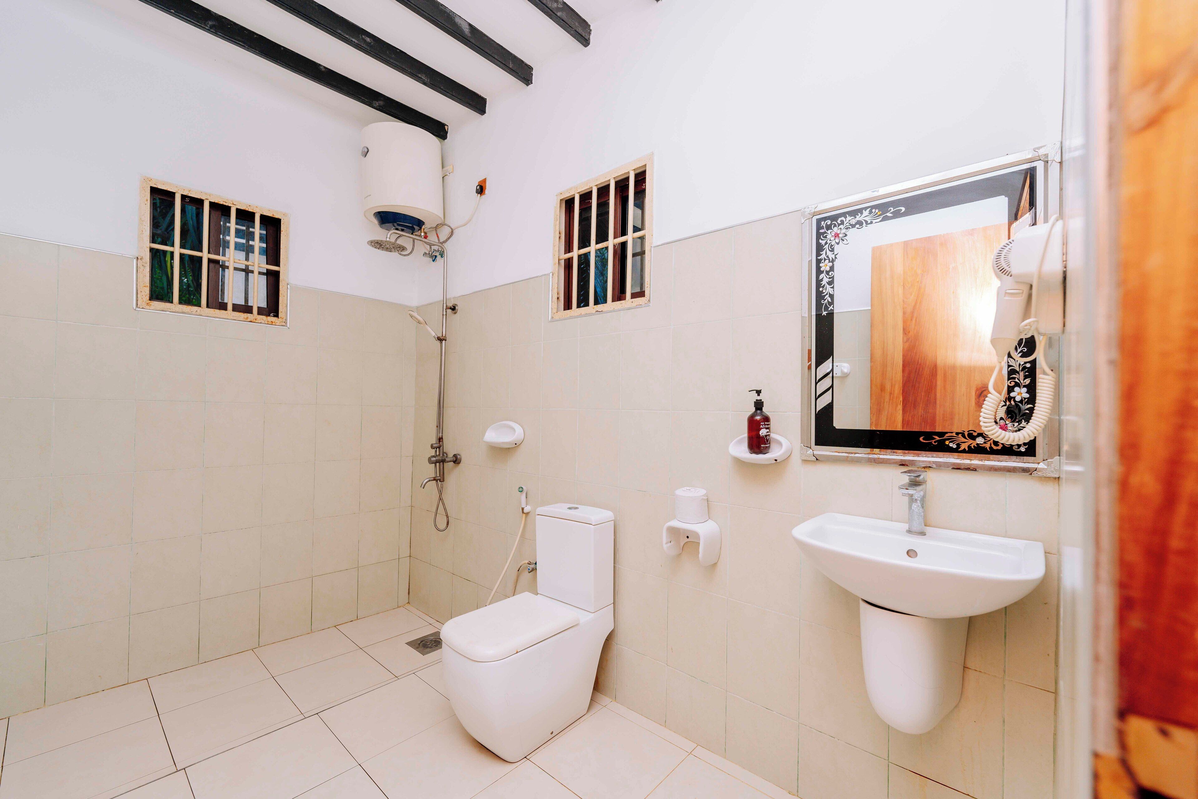 family bungalow, 2 bedrooms, garden view | bathroom | shower, rainfall showerhead, free toiletries, towels