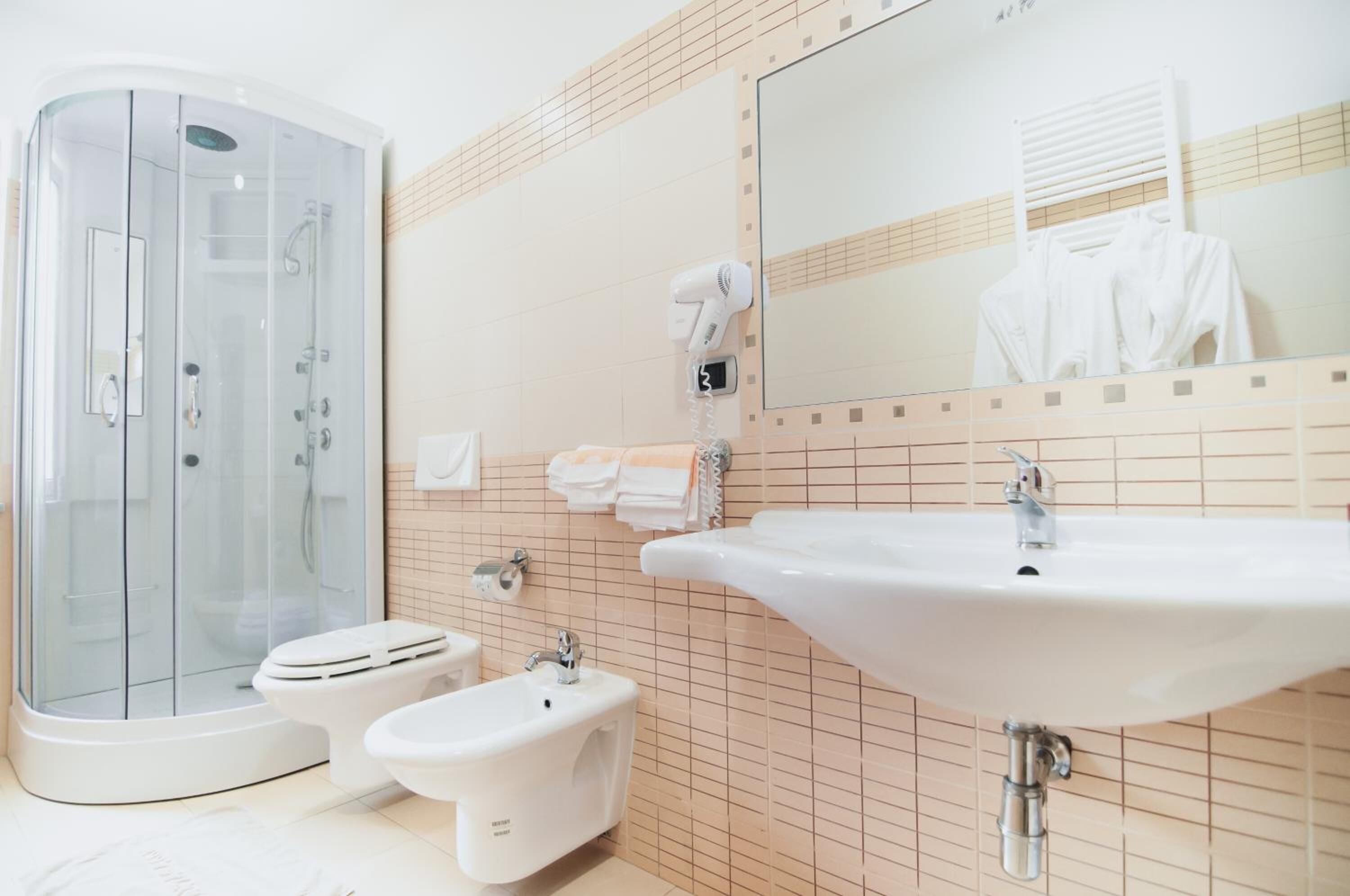 shower, free toiletries, hair dryer, bathrobes