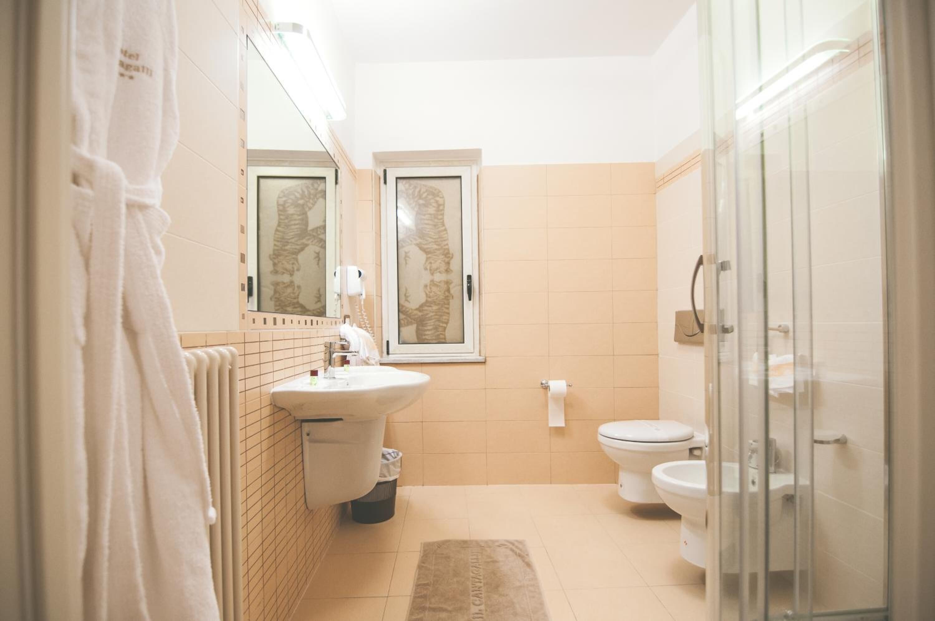 shower, free toiletries, hair dryer, bathrobes