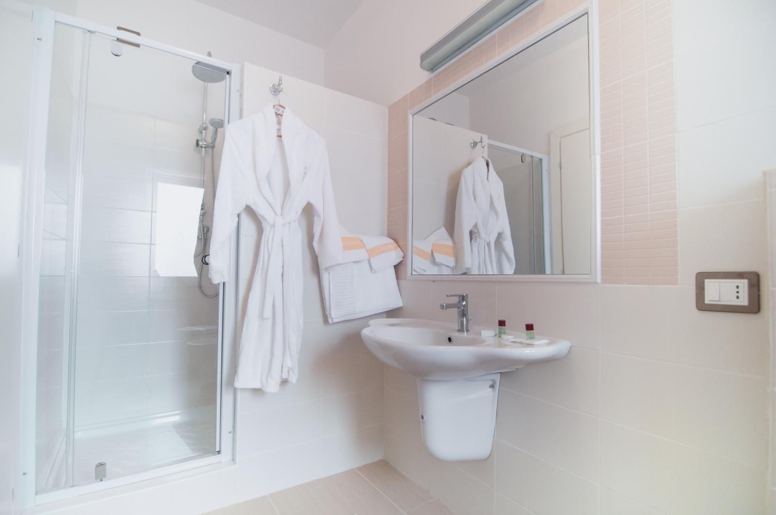 shower, free toiletries, hair dryer, bathrobes