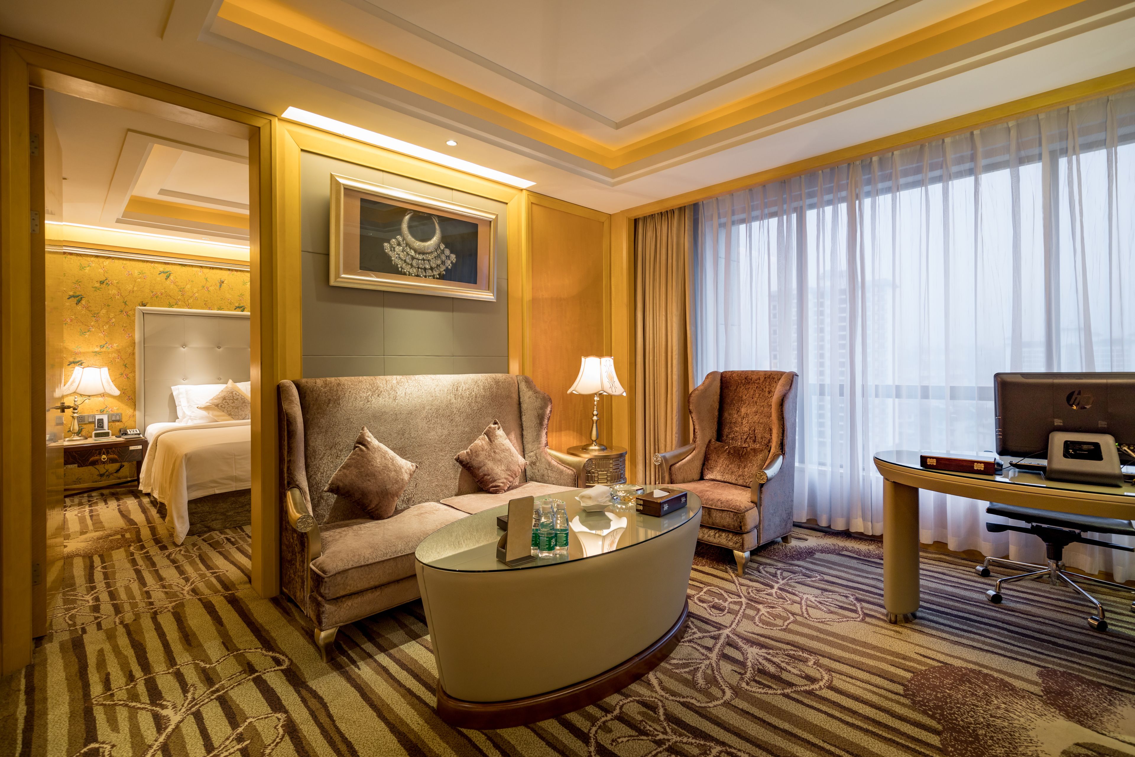 vip suite with living room | minibar, in-room safe, desk, laptop workspace