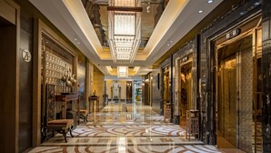 A luxurious hotel lobby with a marble floor, ornate chandeliers, and elegant furniture. - Sunshine Hotel Zhangjiajie (Zhangjiajie)