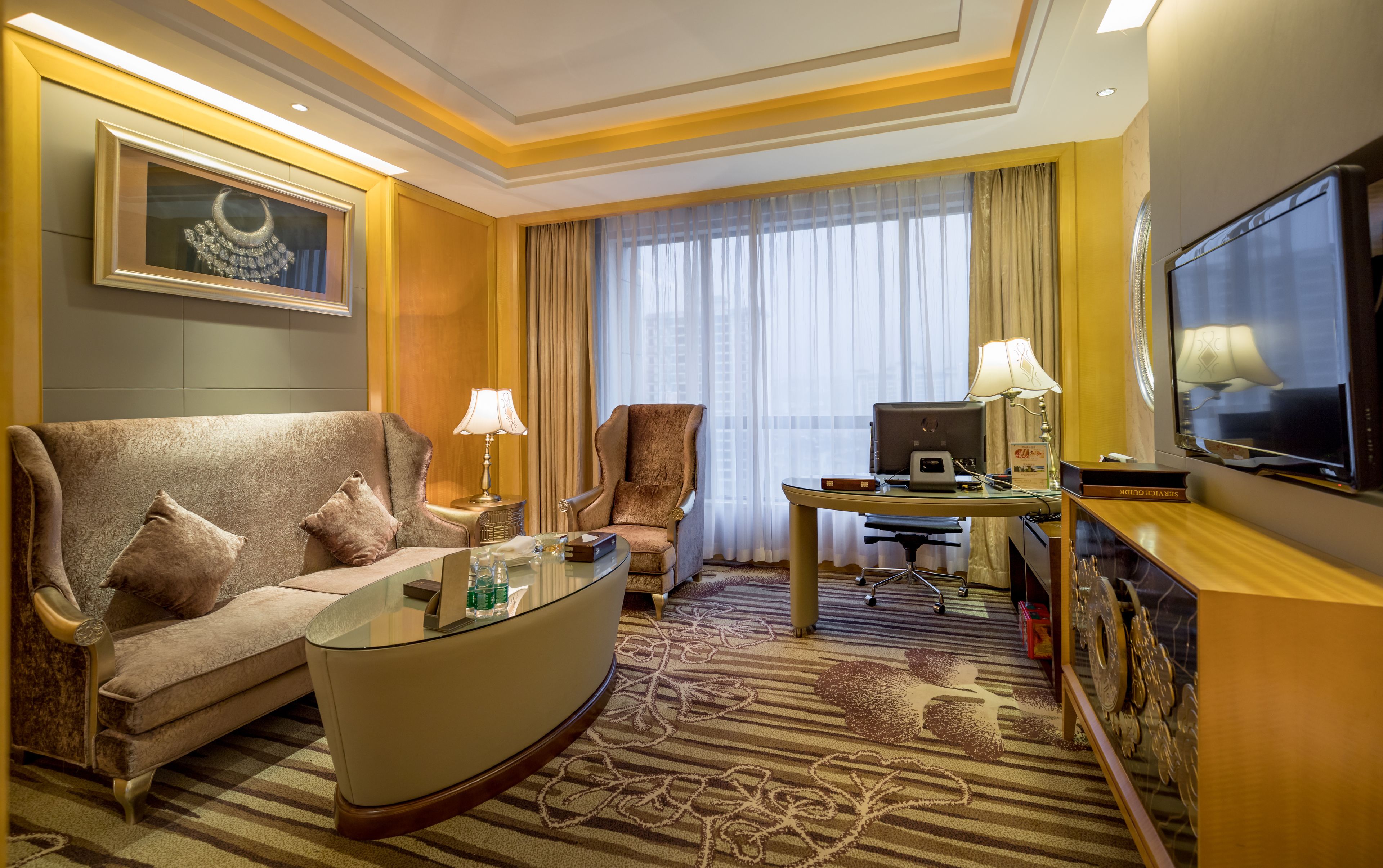 vip suite with living room | minibar, in-room safe, desk, laptop workspace