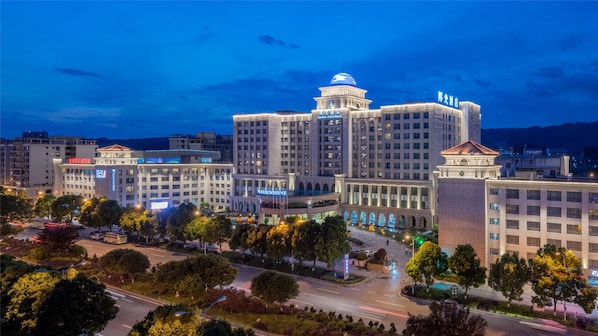 A large hotel complex with multiple buildings, including a prominent dome structure.