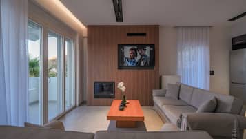Villa, 3 Bedrooms, Sea View | Living area | 40-inch flat-screen TV with satellite channels, TV, DVD player
