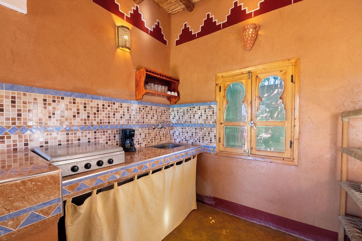 traditional house, multiple beds, garden view, garden area | 1 bedroom, individually decorated, individually furnished