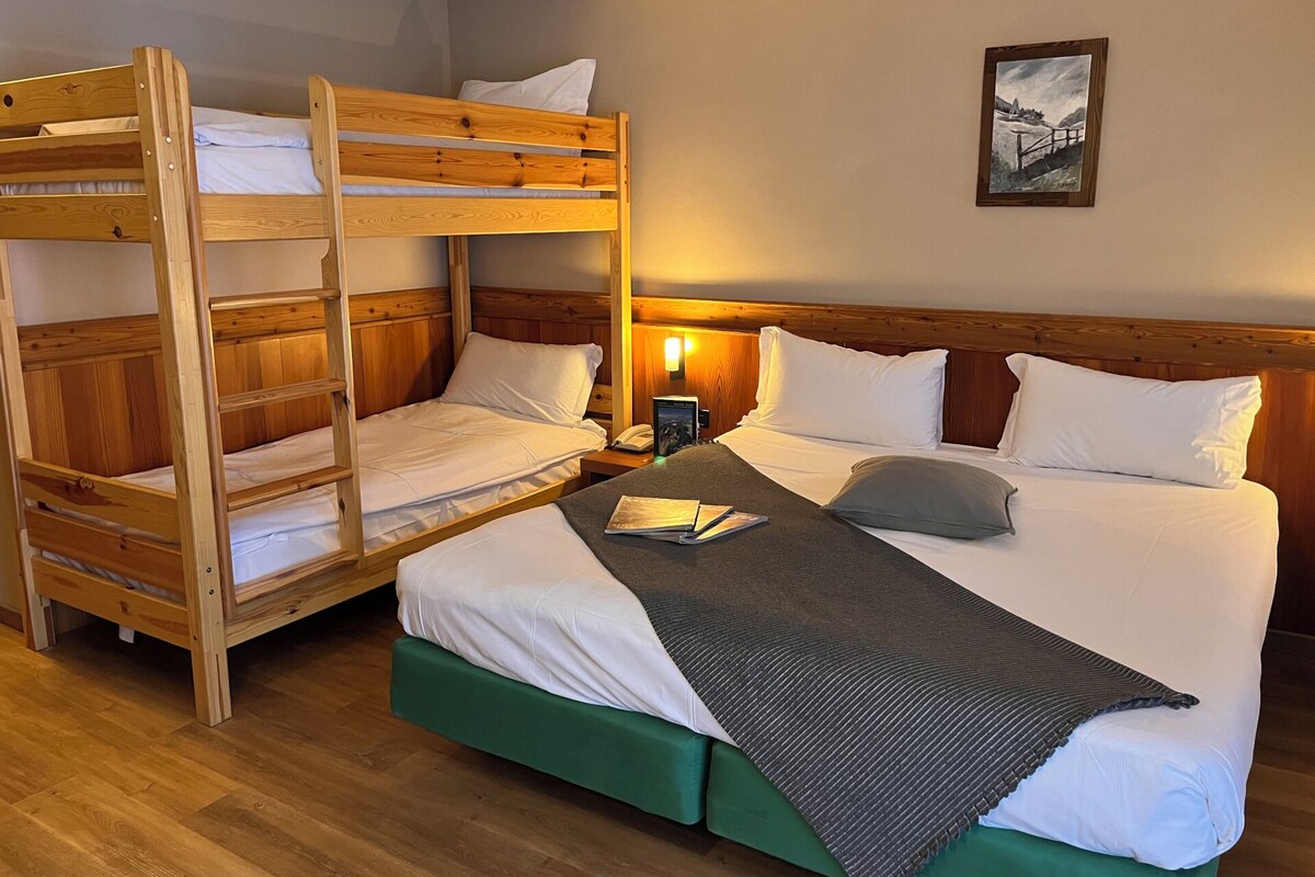 Premium Quadruple Room, Balcony | Down comforters, desk, laptop workspace, blackout drapes