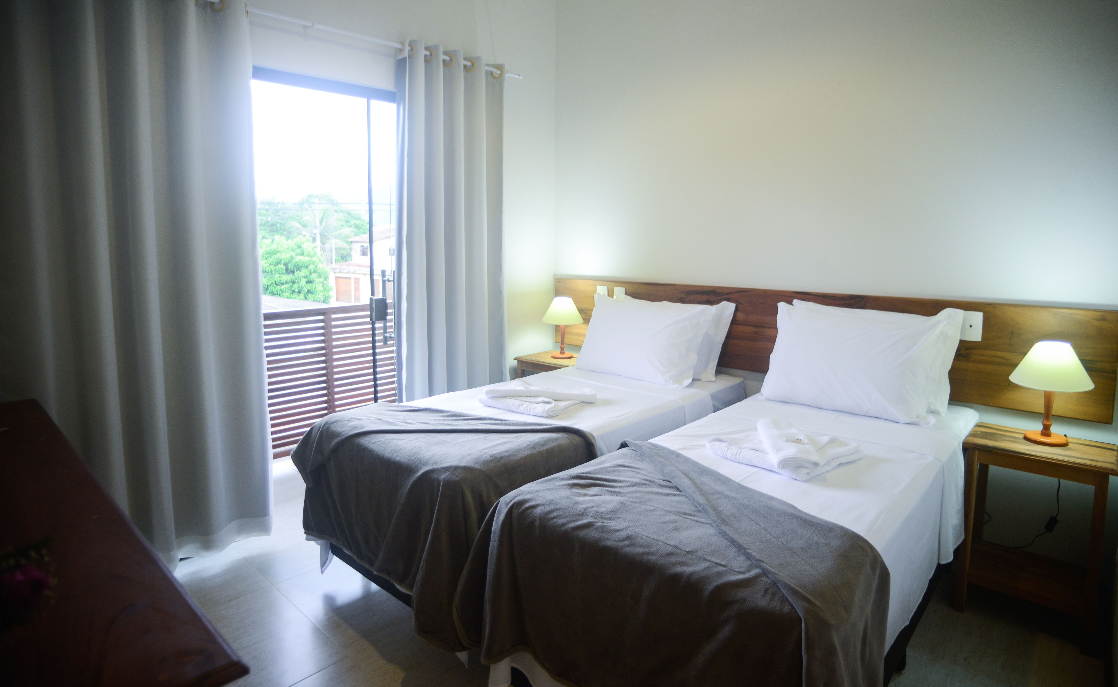 Triple Room | Minibar, blackout drapes, WiFi (free), bed sheets