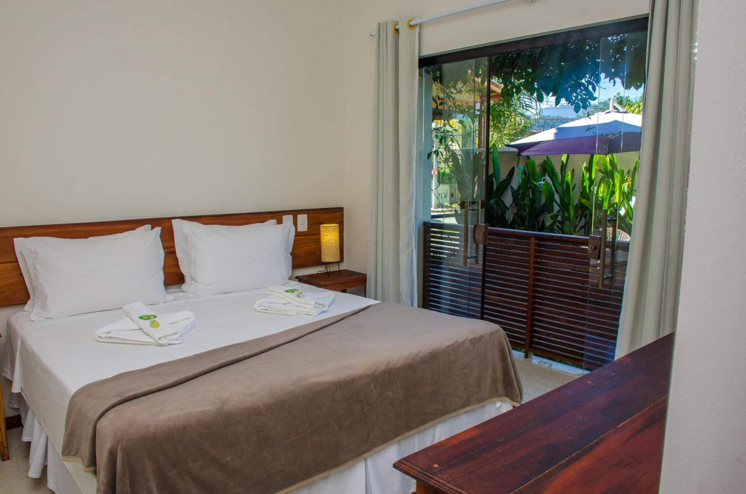 Frigobar, cortinas blackout, Wi-Fi de cortesia, roupa de cama