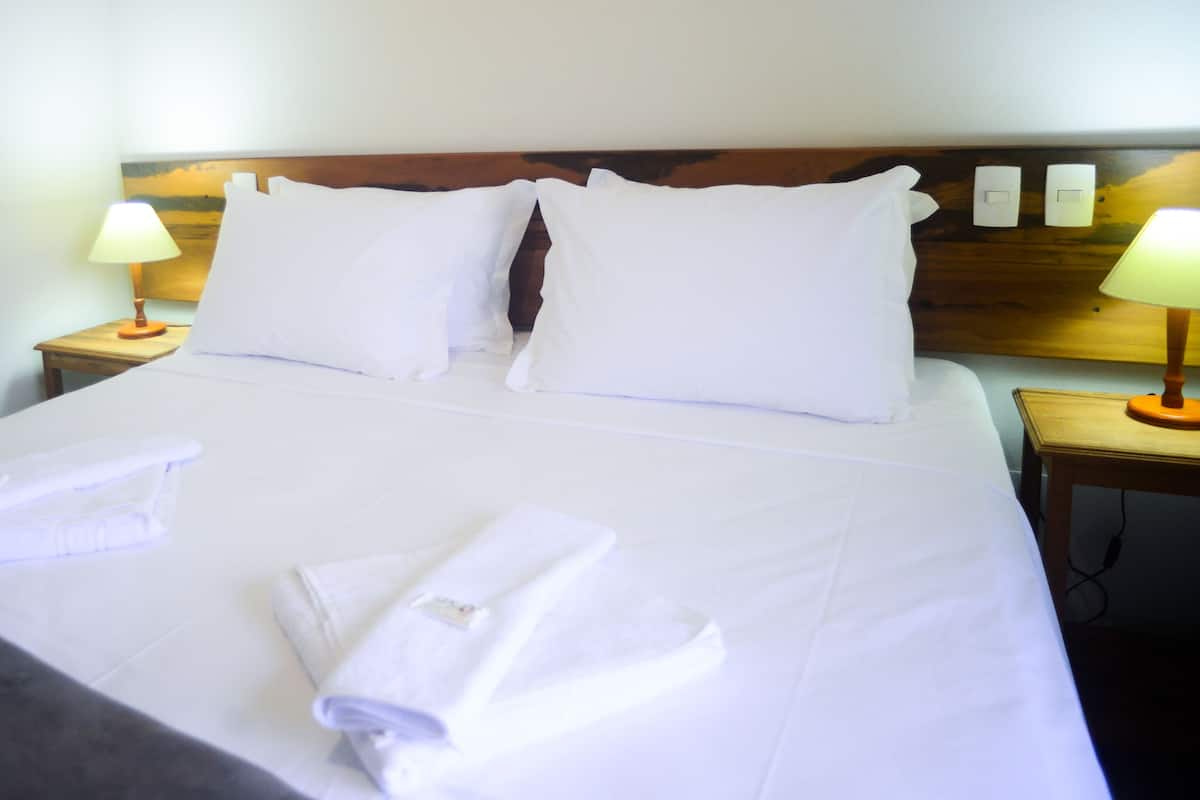 Double Room | Minibar, blackout drapes, WiFi (free), bed sheets