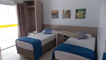 Double or Twin Room | Minibar, desk, blackout drapes, free WiFi