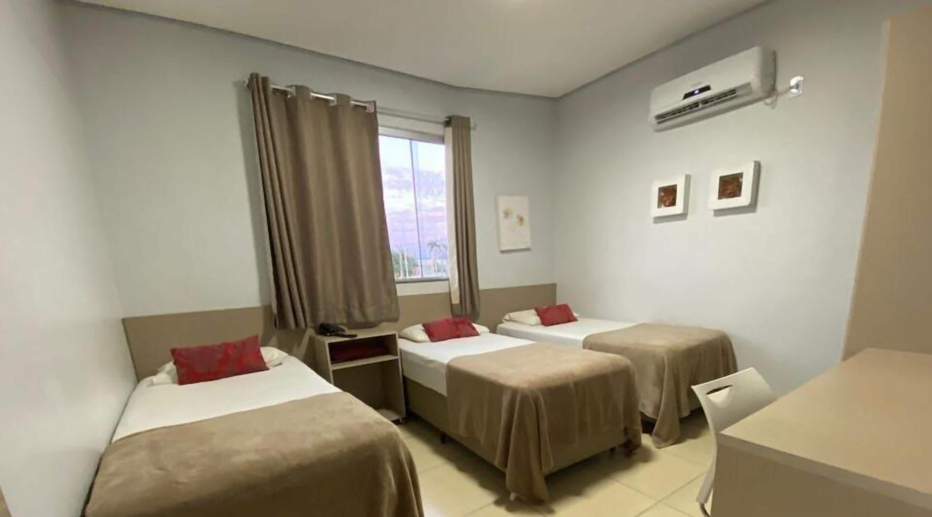 economy triple room | 1 bedroom, minibar, individually decorated, iron/ironing board