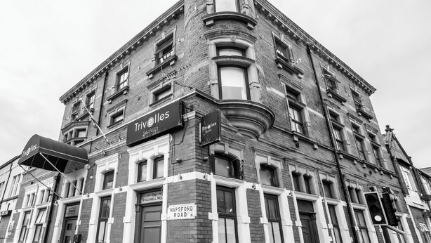 A historic building with a corner turret, multiple windows, and signs indicating 'Trivelles' and 'The Stockwell Mould'. - Trivelles Seaforth (Liverpool)