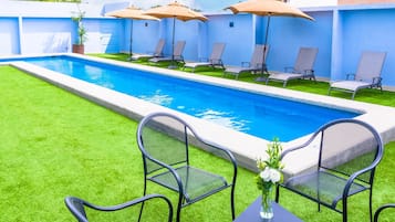 Outdoor pool, pool umbrellas, pool loungers
