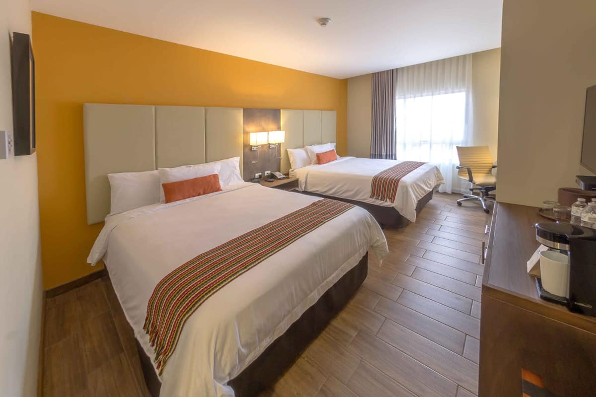 deluxe twin room, city view | in-room safe, desk, iron/ironing board, free wifi