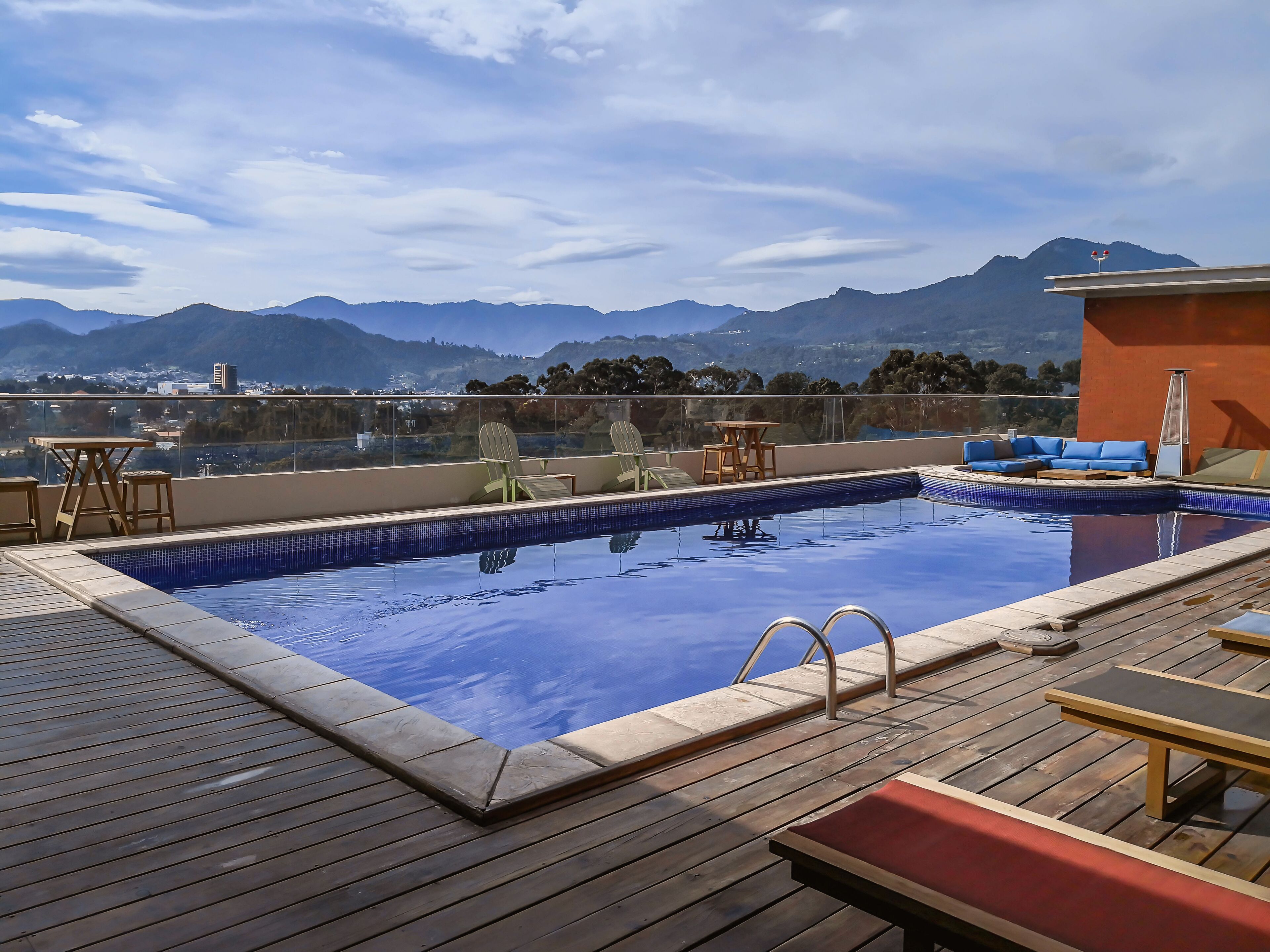 outdoor pool, pool umbrellas, pool loungers