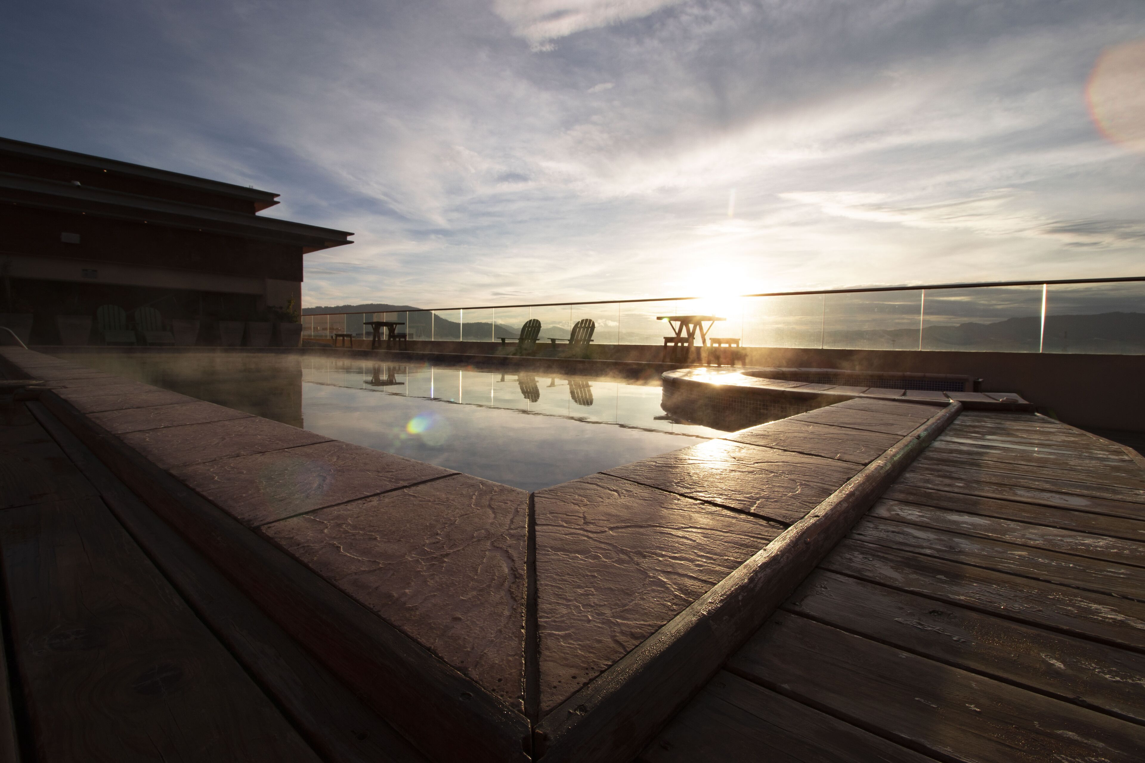 outdoor pool, pool umbrellas, pool loungers