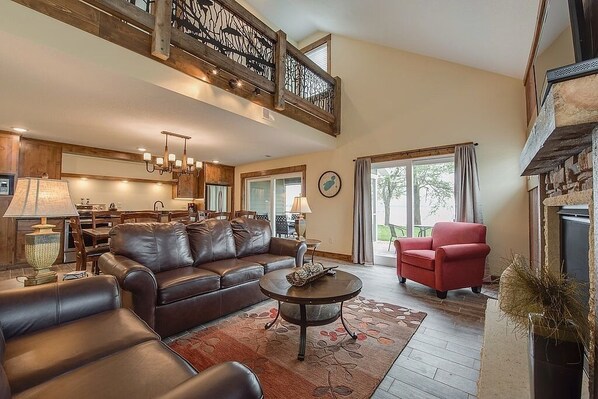 Deluxe Duplex, 4 Bedrooms, Lake View, Lakeside (Minimum 2-3 night stay required) | Living area | Flat-screen TV, fireplace