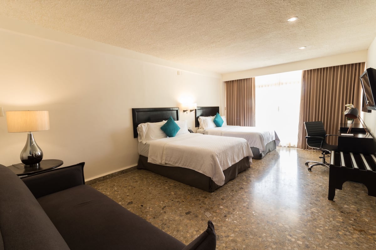 Superior Suite, 2 Double Beds | Minibar, in-room safe, desk, blackout drapes