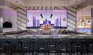 4 bars/lounges, 2 poolside bars