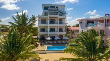 Outdoor pool, pool umbrellas, pool loungers